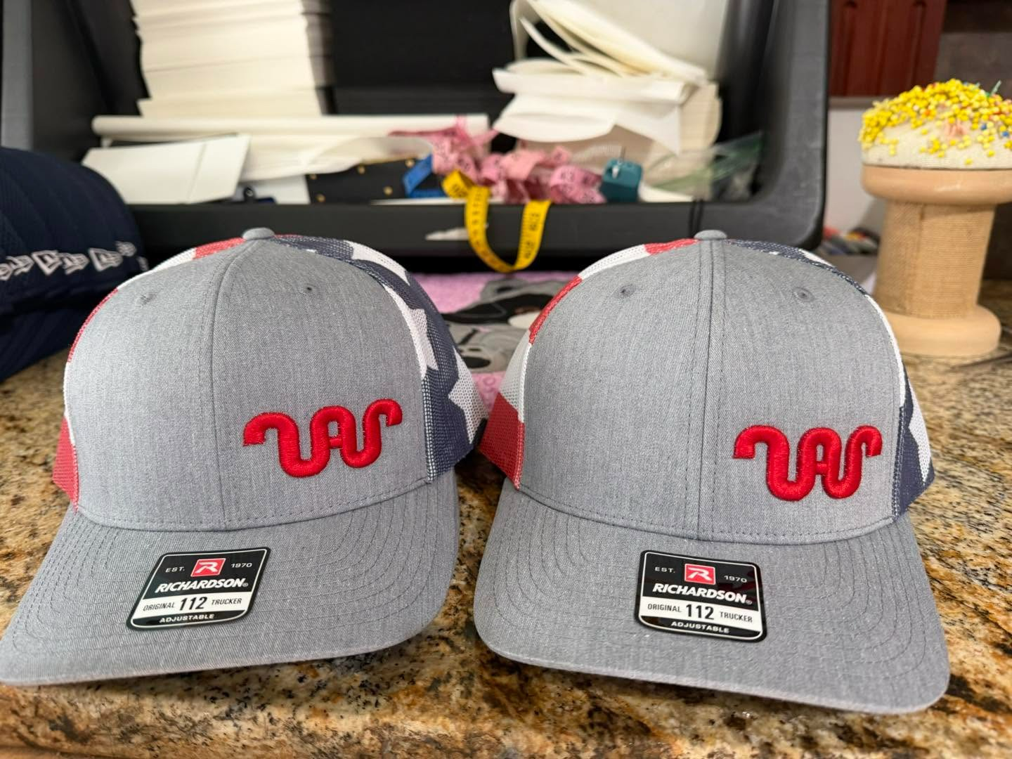 VA logo embroidered on two Richardson trucker caps by David K.